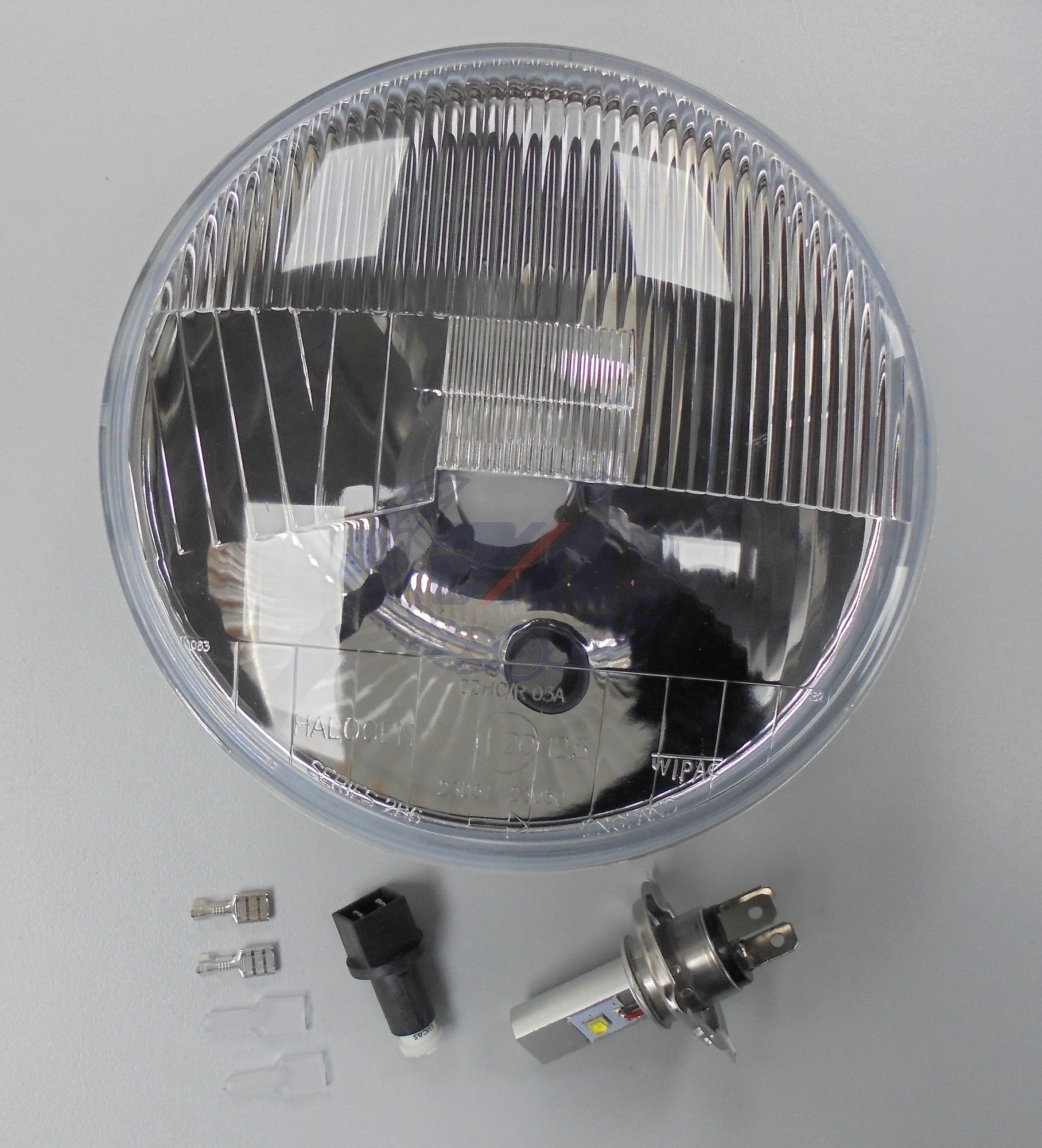HEADLAMP UNIT 7"  H4 L/H DIP WITH TWO LED BULBS WIPAC MAIN & PILOT (54526114) for UK & countries riding on left hand side of the road.