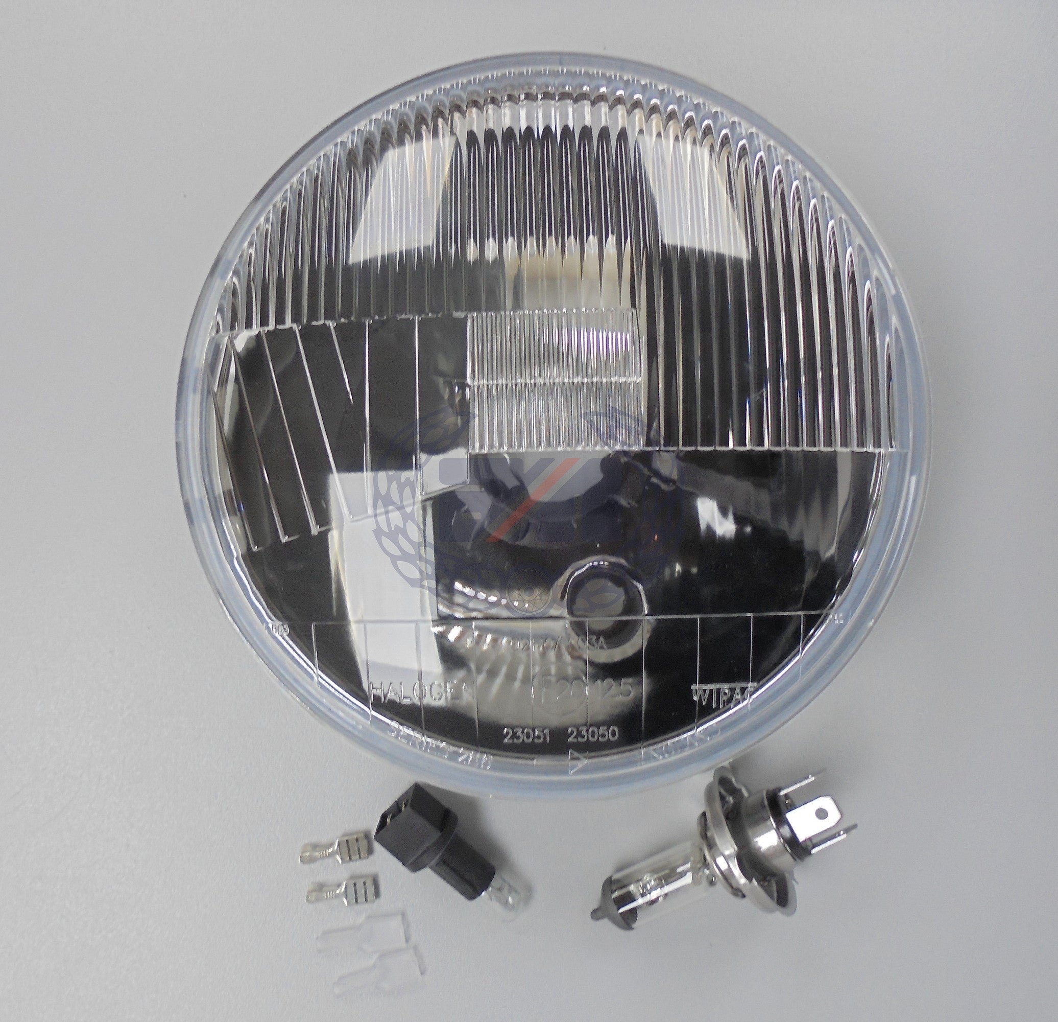 HEADLAMP UNIT 7"  H4 L/H DIP WITH BULBS WIPAC (54526114) for UK & countries riding on left hand side of the road.